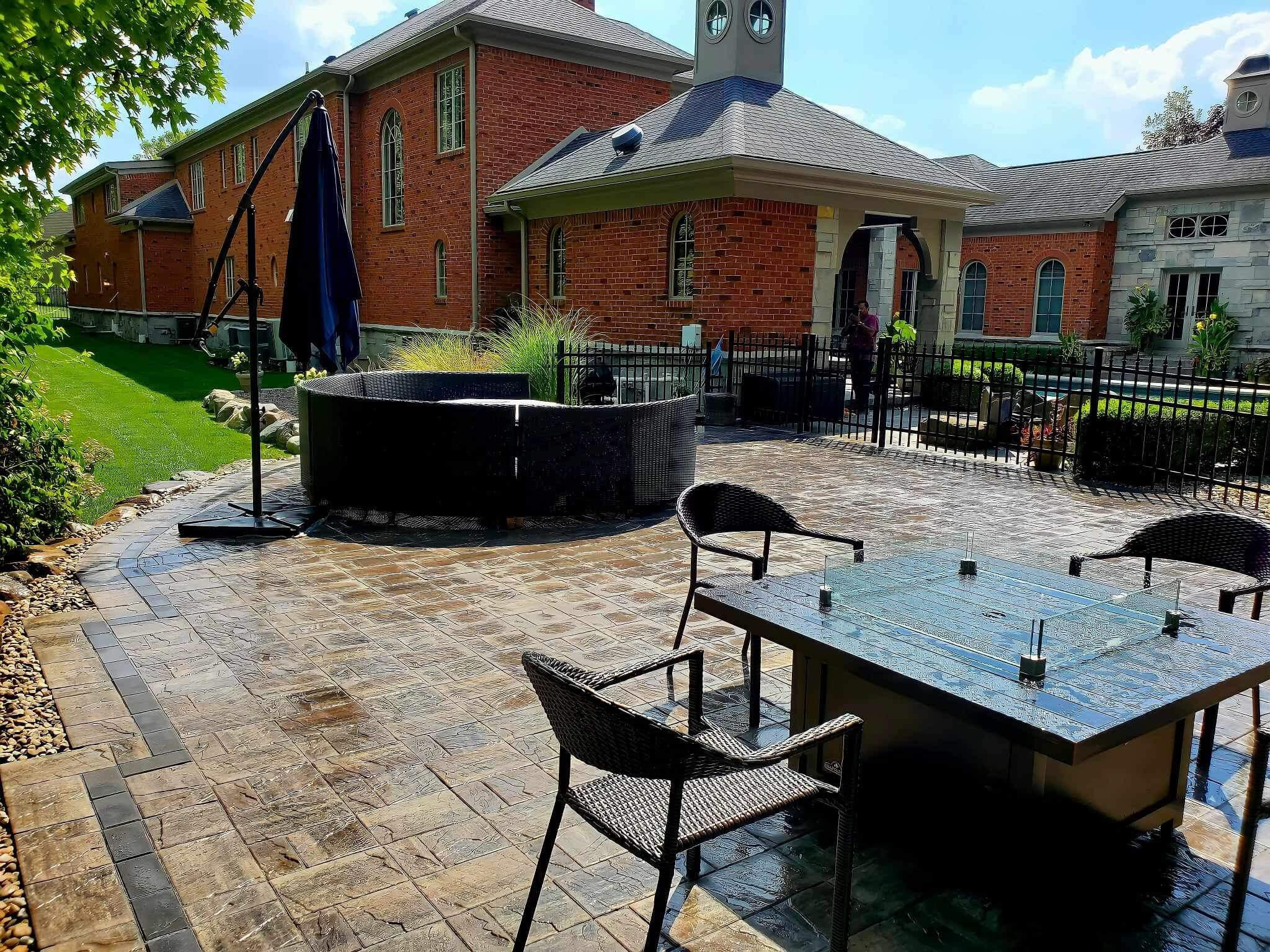 Classic backyard patio design in Indianapolis, featuring a unique blend of patio paver colors for visual appeal.